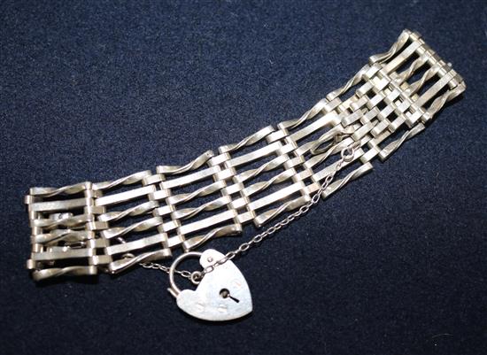 A Chinese silver opium pipe, a gate-link bracelet and sundry chains, etc.